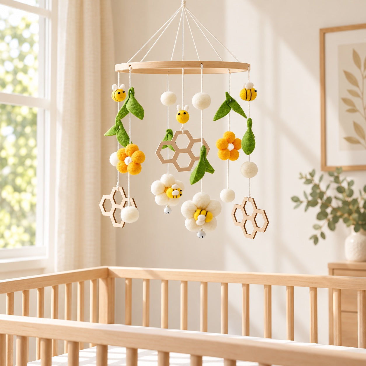 Bee Honeycomb baby mobile styled in a bright nursery