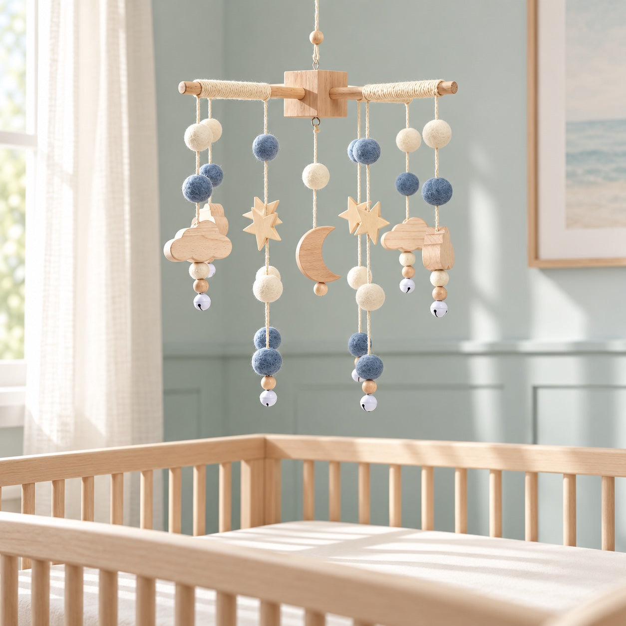 Ocean Orbs baby mobile styled in a bright nursery